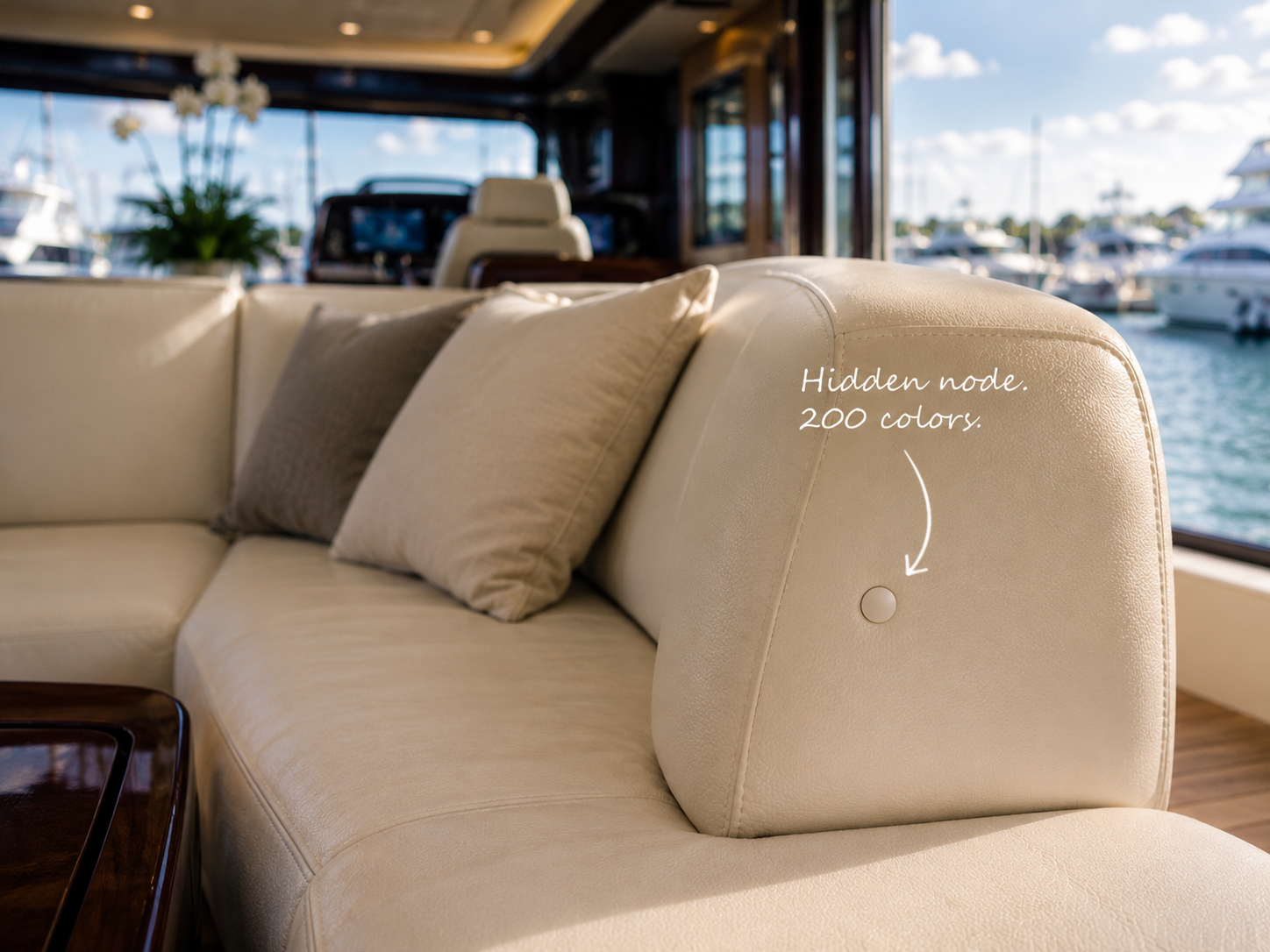 Hidden Digital Tripwire proximity node color-matched to yacht interior leather seating