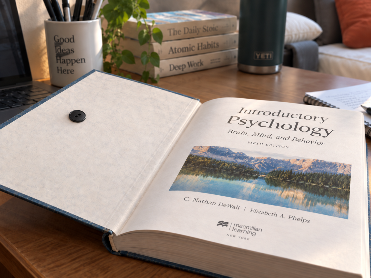 Textbook protected with a black Memora button Pin