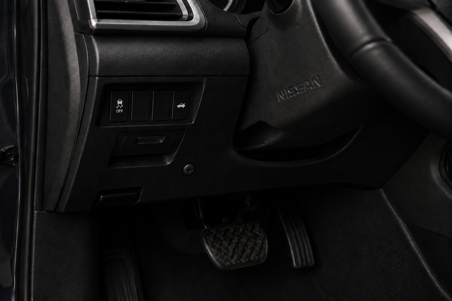 Black Memora screw Pin under SUV dashboard